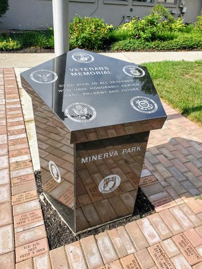 veterans memorial monument surrounded by bricks. 